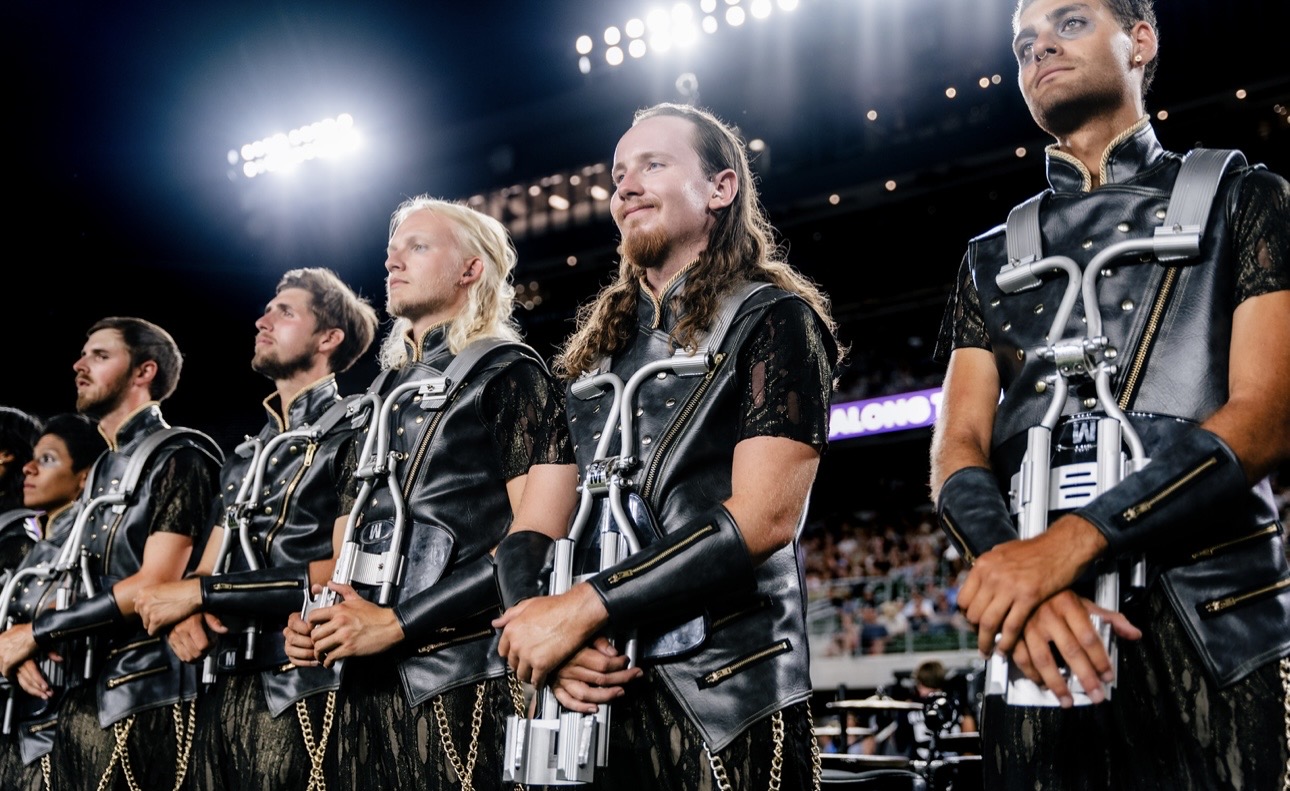 Image of Lex in Uniform under Stadium Lights